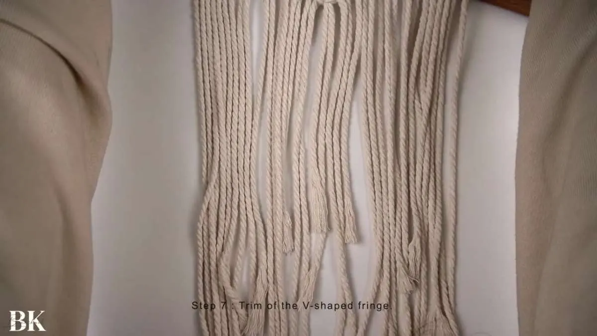 Untrimmed macrame wall hanging fringe before cutting into V shape